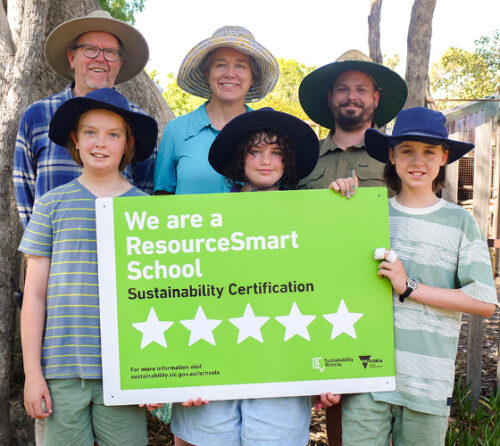 picture of students and teachers winning their award